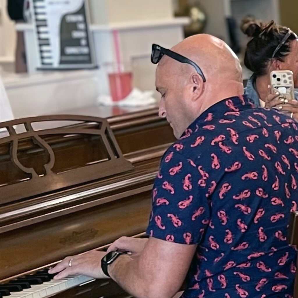 A man plays the piano at The Boulevard Senior Living of Wentzville, an event his family member found great joy in.