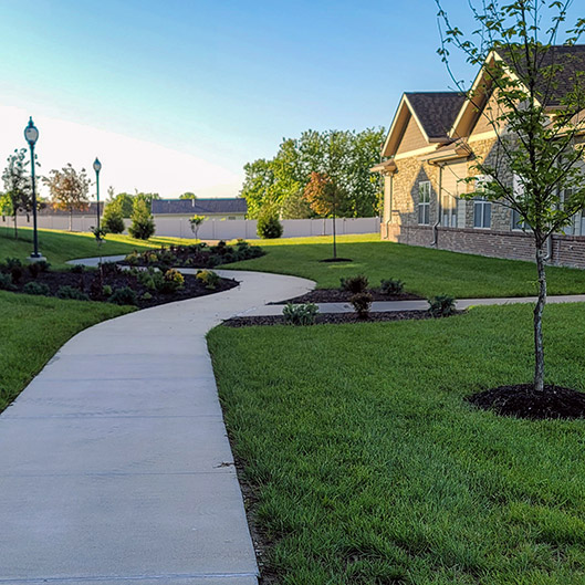 View of the landscaped grounds at The Boulevard Senior Living Wentzville.